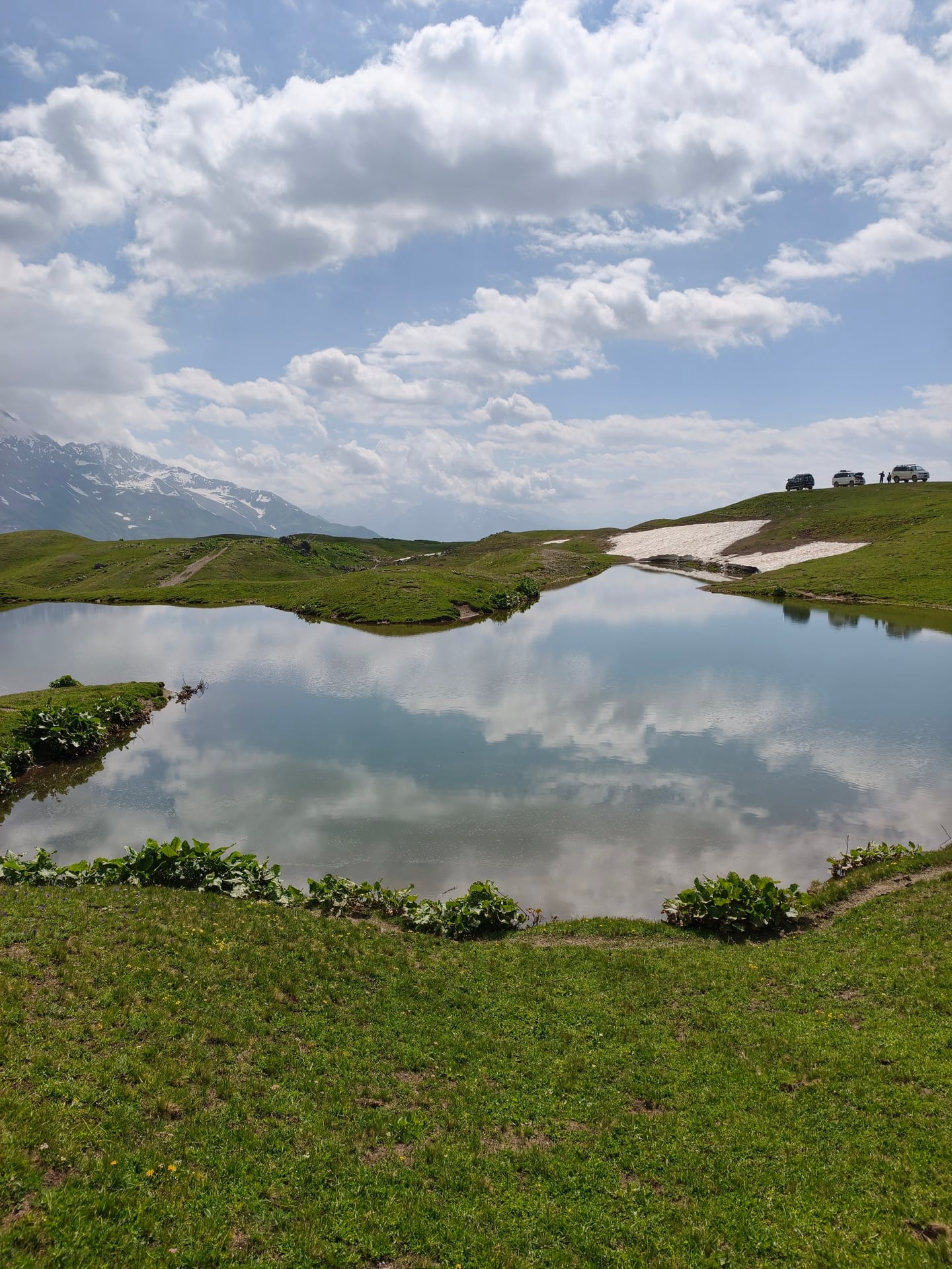 Koruldi lake reflecting the clouds
